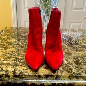 Stunning bright red suede heeled booties.  Side zip.